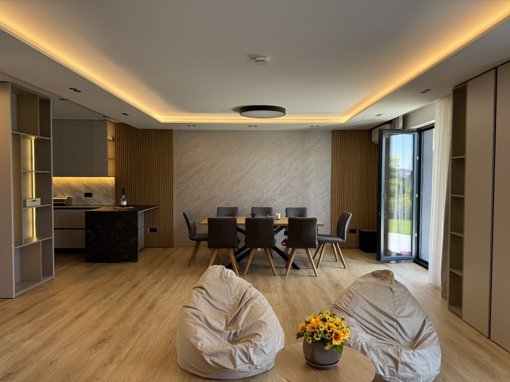 Open-plan dining area and kitchen in House 56, River Park Sofia