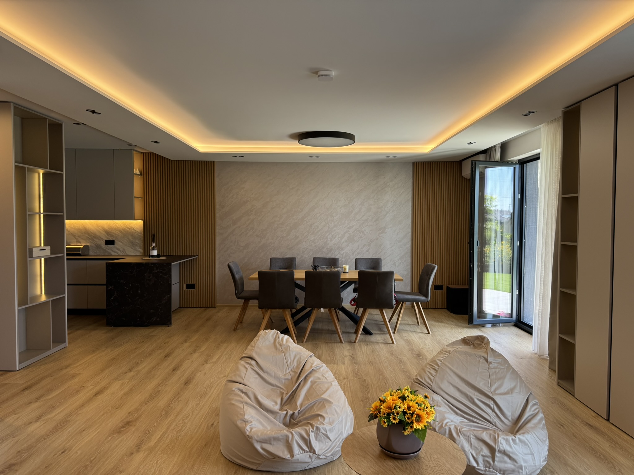 Open-plan dining area and kitchen in House 56, River Park Sofia